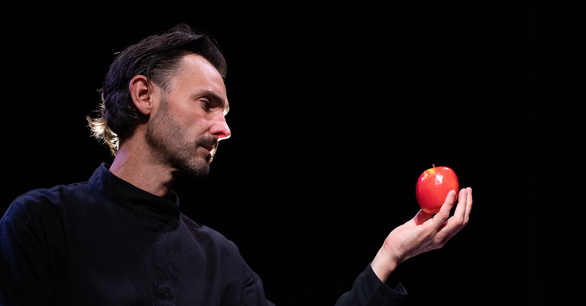 Man holding red object