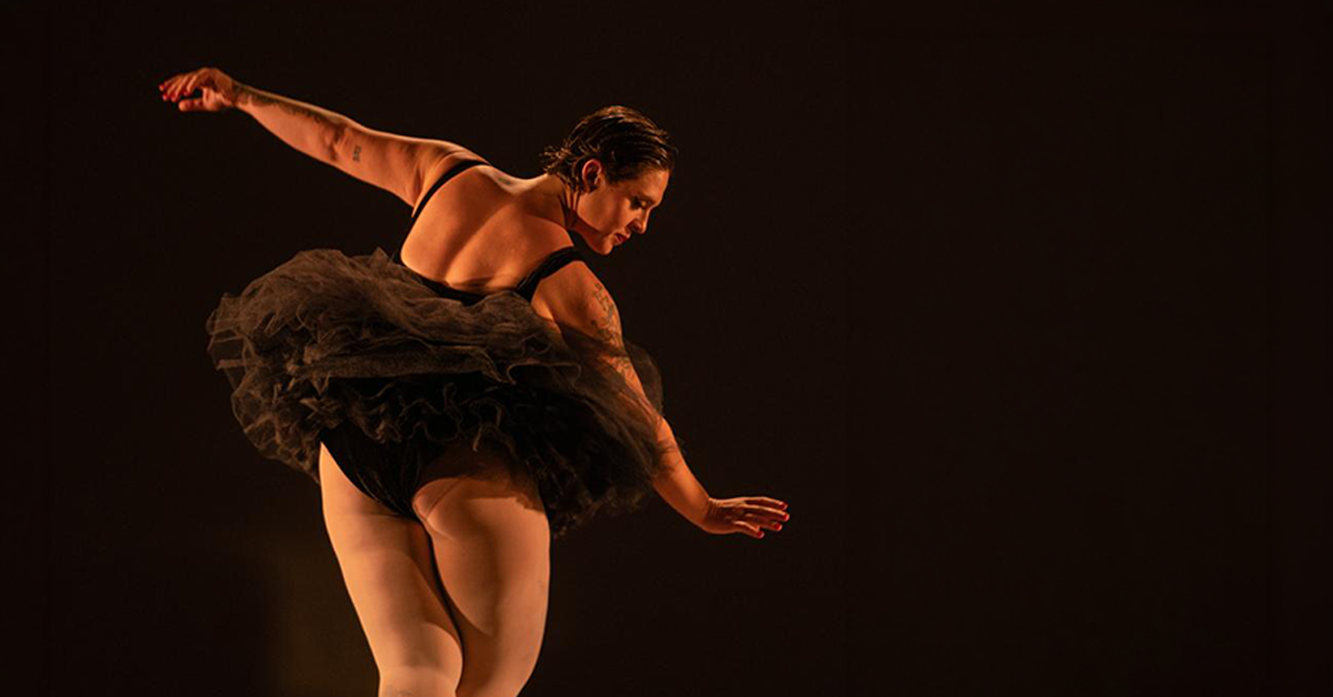 Woman on stage performing